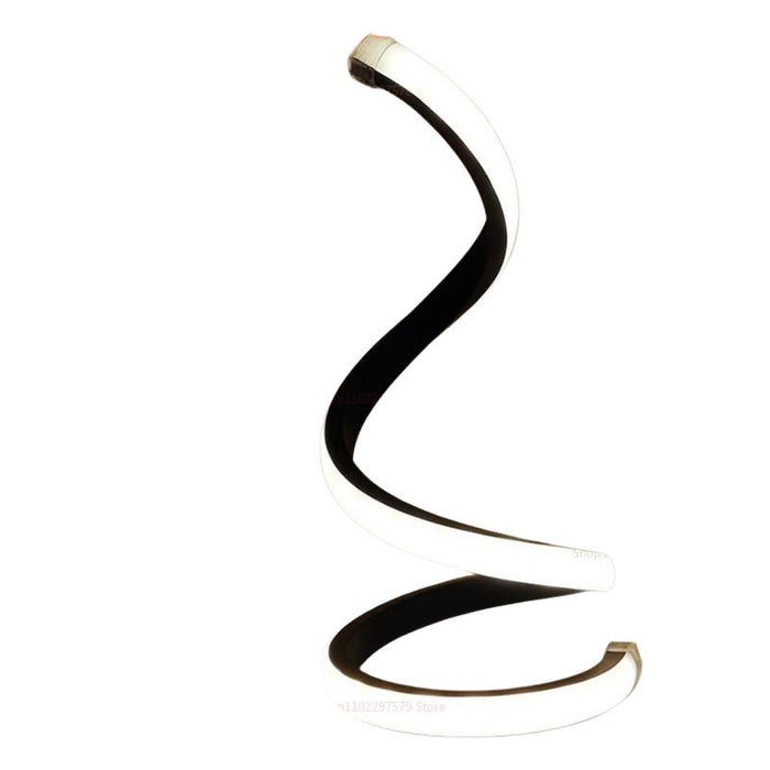 Detalhe da estrutura em espiral da luminária LED com design minimalista e base circular preta.